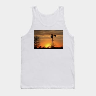 Kansas Blazing orange sunset with a Windmill silhouette with clouds. Tank Top